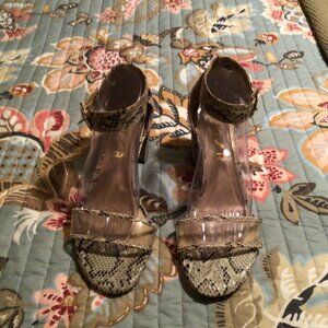 Unisa brand sandals with a snakeskin print and clear straps. Size 10M